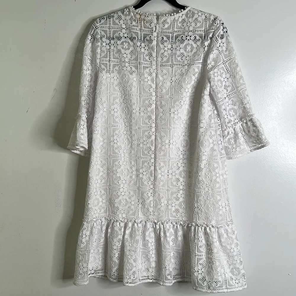 Kate spade Gul pure white lace mini dress raffle hem bell sleeve size 6